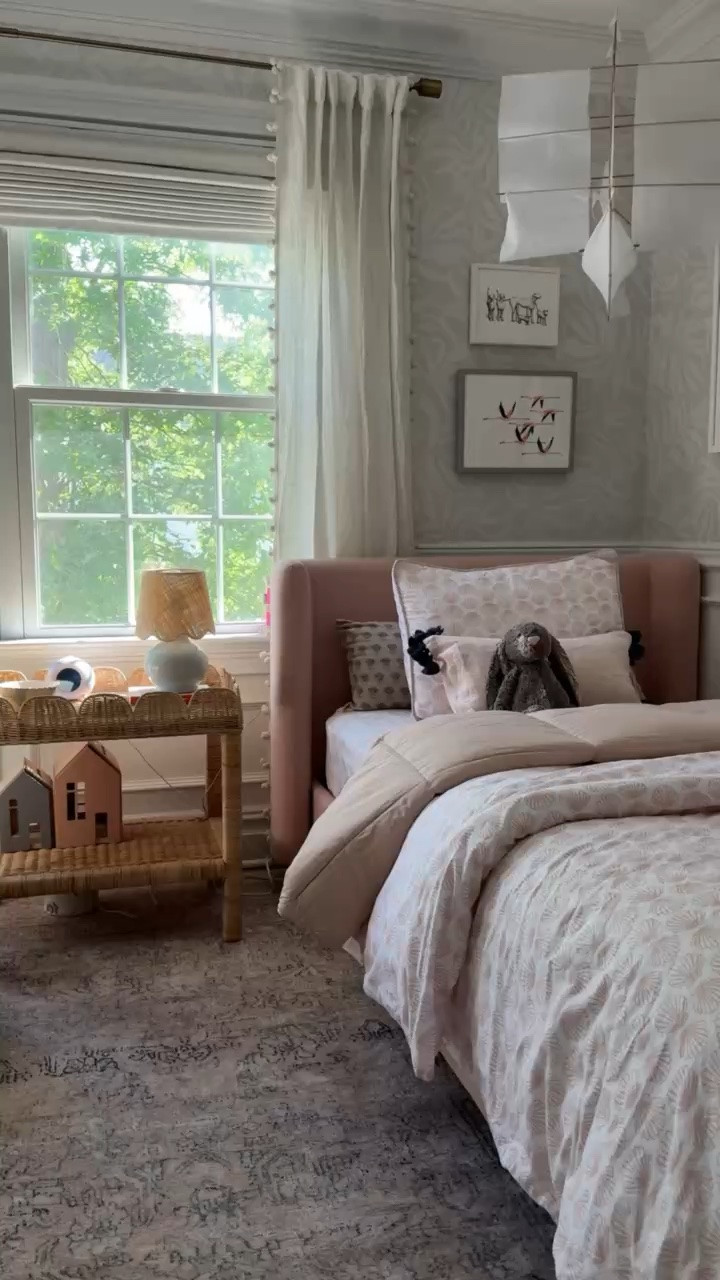 Such a sweet little room filled with soft color, playful pattern, and pieces that can grow with her. The mix of blush, woven textures, and whimsical details makes it feel cozy without being overly themed.

girls bedroom decor, kids bedroom ideas, pink bedroom, girls room inspiration, kids room decor, patterned bedding, woven furniture, bedroom rug, playful home decor, girlonthehudson

#LTKHome #LTKKids #LTKBaby