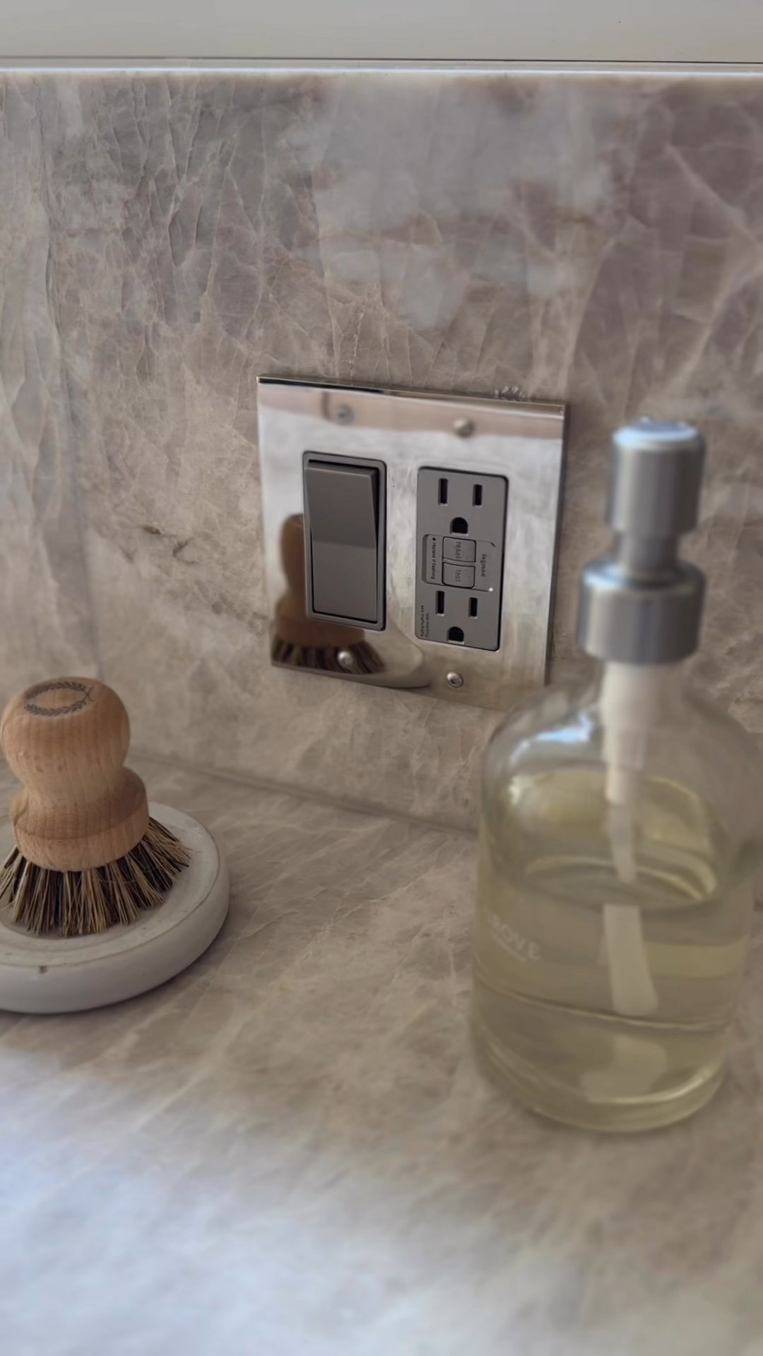 When you’re swapping a new outlet plate in, don’t forget to also change the outlet receptacle! That’s the fancy name for the bit you plug into. It’s a small detail, but it makes a big impact in the overall cohesive feel of your space! We used polished nickel outlet plates that match our faucets, and I found Warm, nickel receptacles that blend almost perfectly. So much more intentional looking than if we had left them bright white! #renovation #homedecor #homehacks

#LTKFindsUnder50 #LTKHome