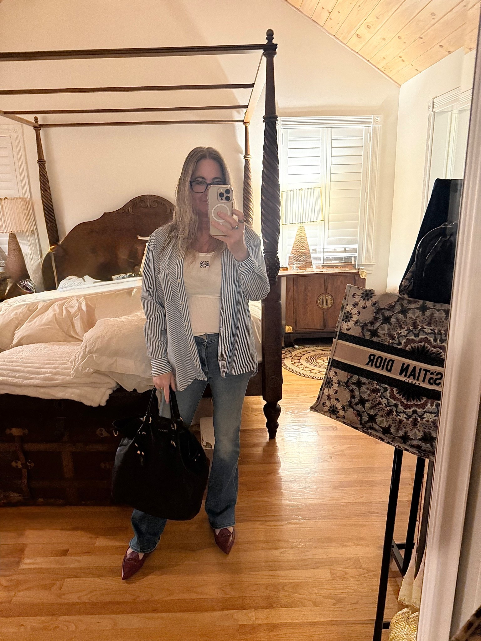 Birthday dinner fit. Thrifted striped shirt, Loewe tank, vintage Prada bag, Mother jeans and Jcrew flats. Linked below! 

#LTKStyleTip #LTKItBag #LTKOver40