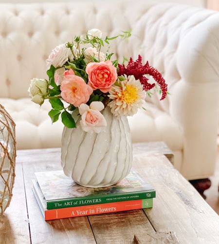 My gorgeous white tufted sofa. White chesterfield sofa. White ceramic vase. Wood coffee table. Gardening books. Cozy living room. Cozy family room. Forever furniture. 💖🌸

#LTKhome #LTKsalealert