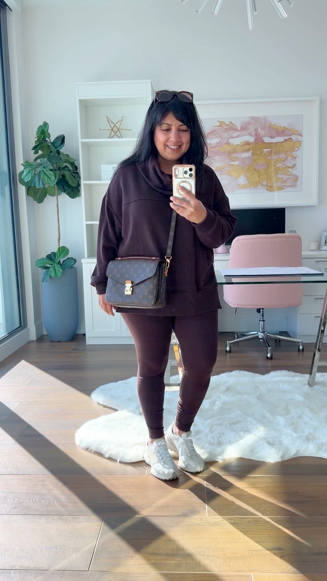 Today’s cozy set for running errands! Love this chocolate brown Varley set that’s a great for lounging at home, running errands and it’s the perfect airport outfit and travel outfit for long flights too! Varley oversized cowl neck tunic sweatshirt with gold zipper details size large and Varley leggings size large. Wearing both in the color coffee bean. So soft, comfy and cute! New Balance 327 sneakers true to size. 

#LTKActive #LTKTravel #LTKMidsize