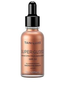 Tan Luxe Super Gloss SPF 30 from Revolve.com | Revolve Clothing (Global)