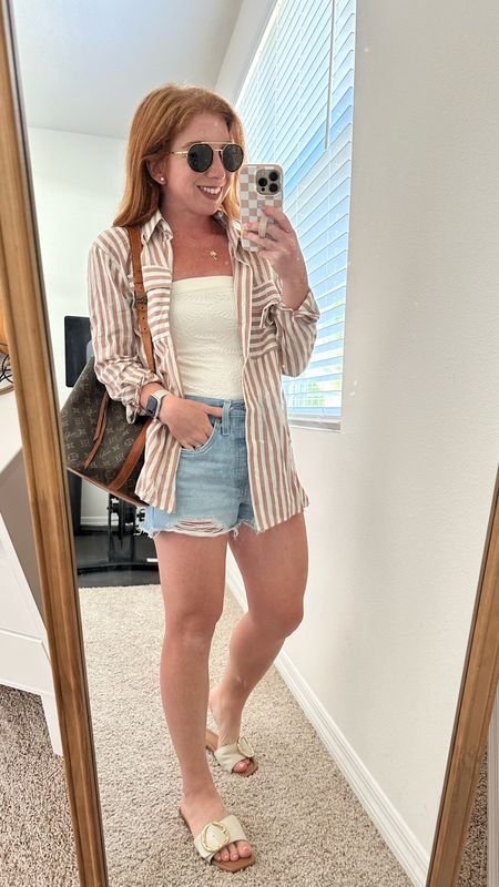 Beach night outfit. Amazon free people dupe tube top. Amazon button down shirt. Levi’s from free people. Target sandals 

#LTKstyletip #LTKfindsunder50 #LTKfindsunder100