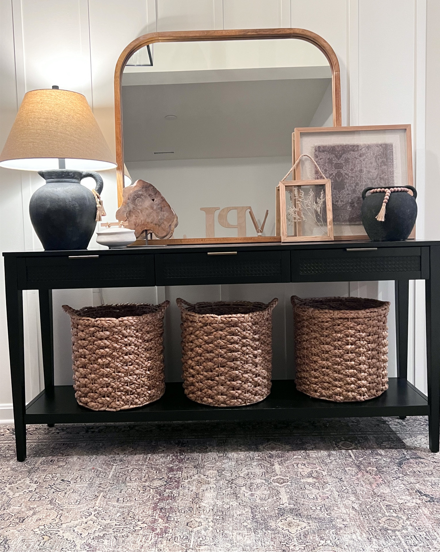 Shop my entryway! So many questions in this ✨

Target black console table, wicker baskets, jug lamp, framed tapestry, wooden mirror, loloi rug 

#LTKstyletip #LTKhome #LTKFind