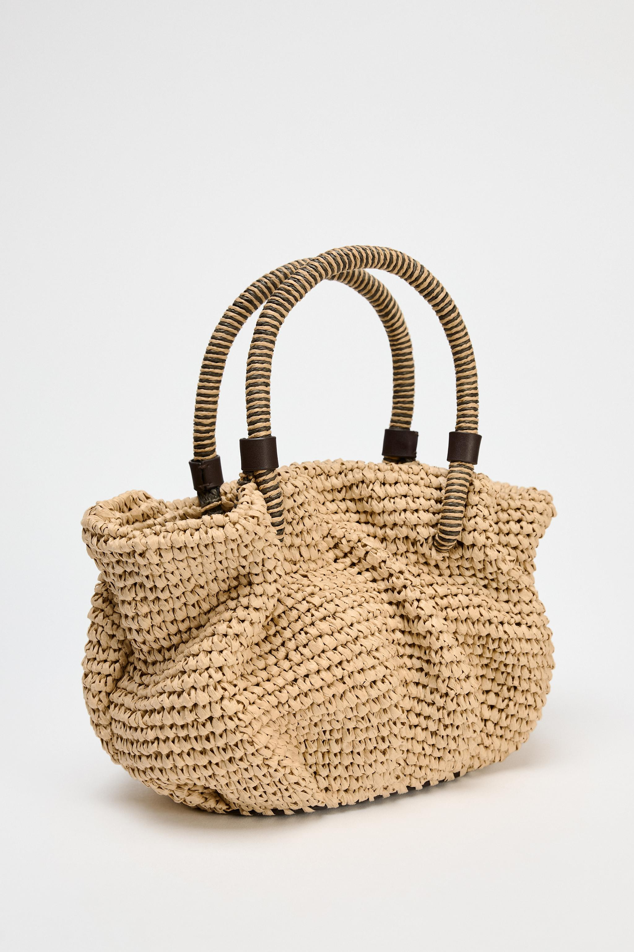 Braided mini bucket bag. Top handles.Height x Length x Width: 26 x 26 x 18 cm. / 10.2 x 10.2 x 7.... | Zara UK
