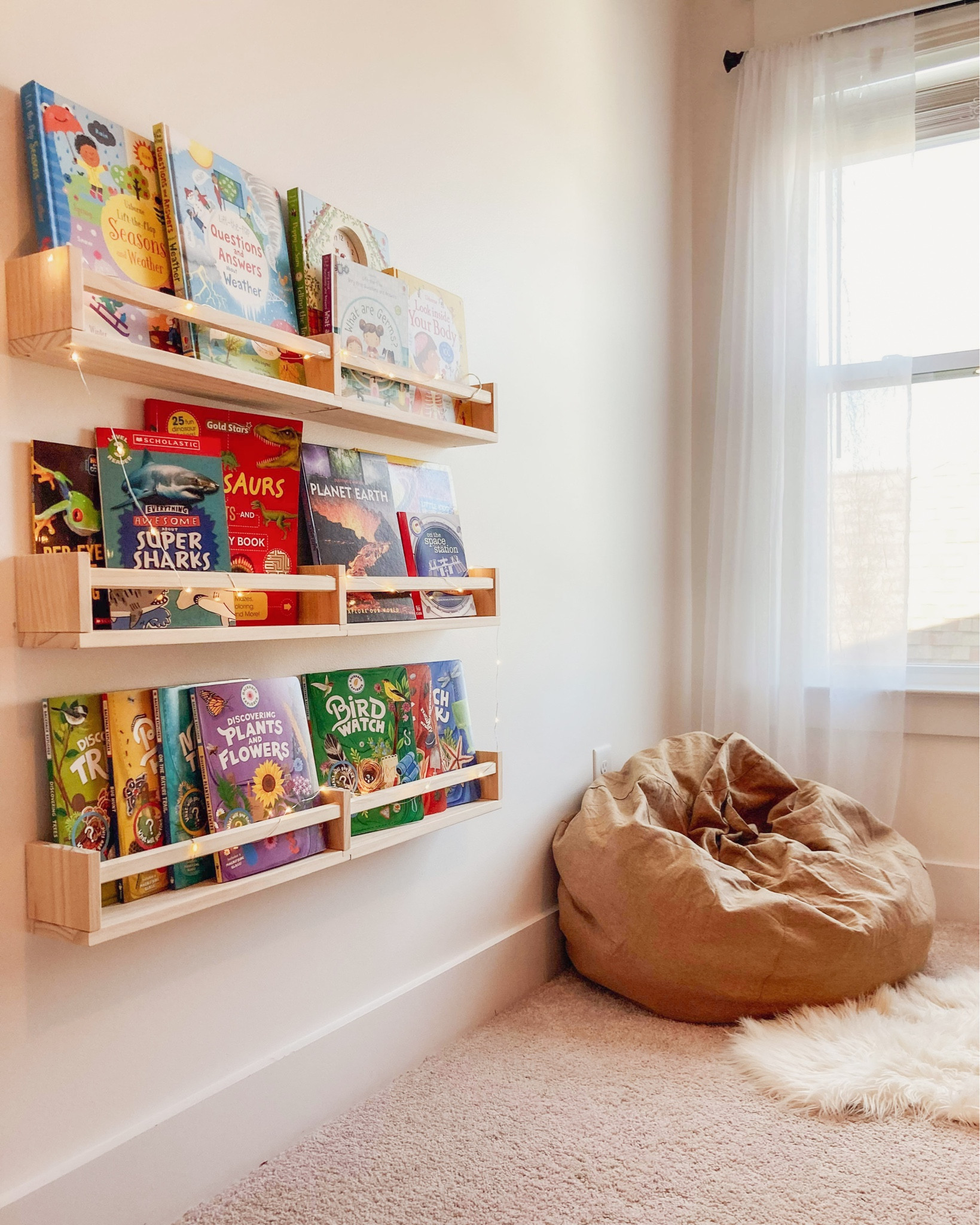 Homeschool Room Reading nook is almost finished! We’ve got the forward facing bookshelves mounted with books displayed, and the Bean Bag filled with stuffed animals. Now we just need some simple styling and we’re good to go! 

#LTKFindsUnder100 #LTKStyleTip #LTKHome