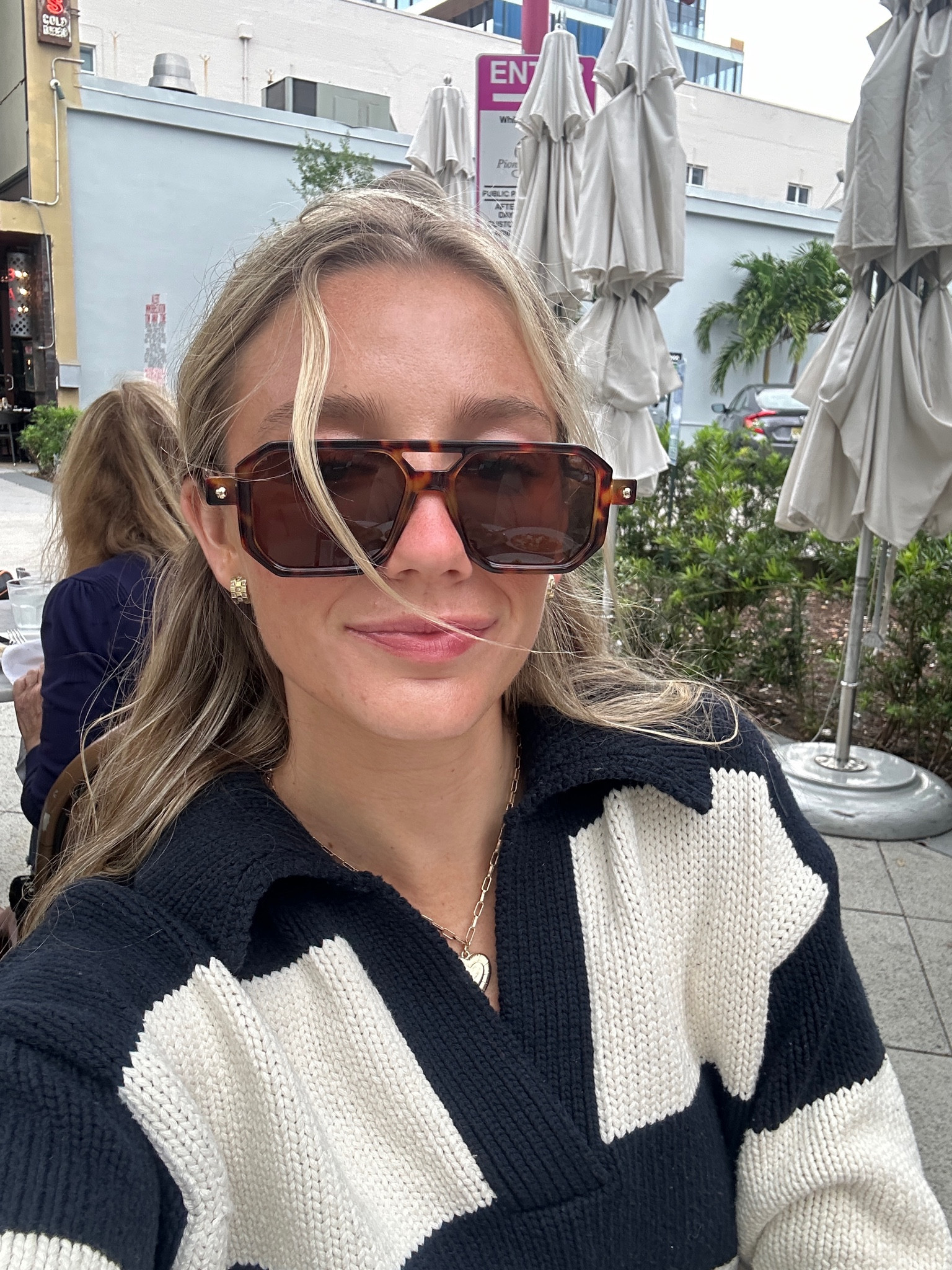 Rectangle sunglasses with gold jewelry and striped collared sweater 

#LTKSeasonal #LTKtravel #LTKfindsunder50