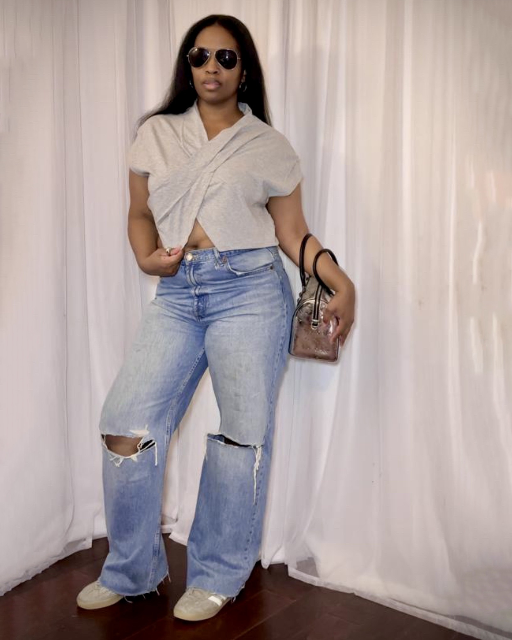Relaxed look. I’m wearing a crossover top paired with denims. 

Bag @michaelkors-us 
Shirt @Target 
Jeans are from @Zara 
Sneakers @adidas 

#comfystyle #everydaywear #momstyle

#LTKootd #LTKMidsize