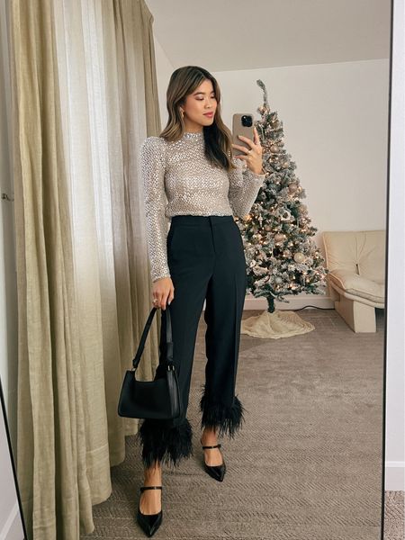Revolve silver sequin top with J. Crew black feather trimmed pants and black patent leather heels with a Madewell black purse!
 
Top: XXS/XS
Bottoms: 00/0
Shoes: 6

#winter
#winteroutfits
#winterfashion
#winterstyle
#holiday
#giftsforher
#revolve
#jcrew
#madewell
#holidayoutfit
#holidayparty
