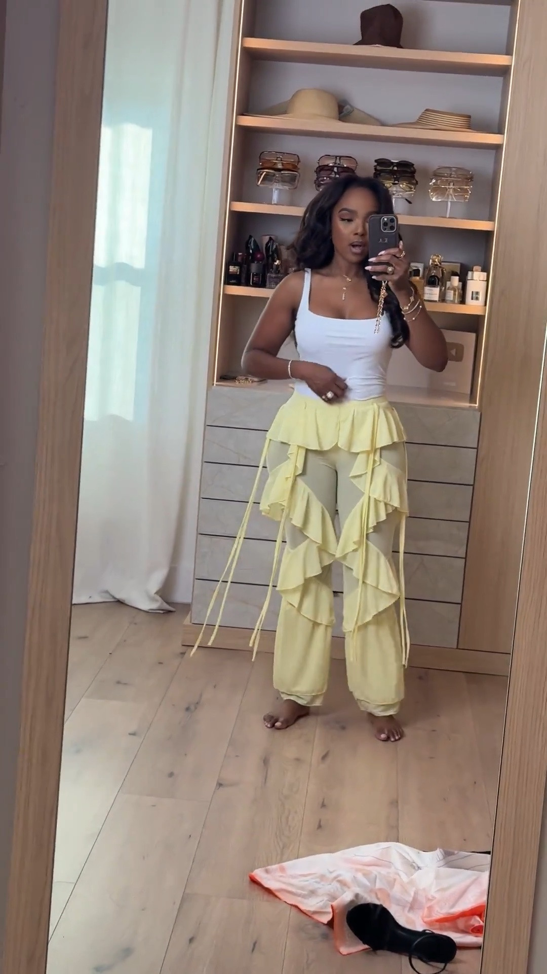 Hi Babes! 💛✨

How fun are these statement ruffle pants?! They instantly make any outfit look elevated while still being lightweight and comfortable. Just add a simple tank and let the pants do all the talking!

✨ Fit Details:
• Wearing a size Small
• Statement layered ruffle pants
• Soft fitted white tank
• Lightweight, flowy fabric
• Elastic waistband for a comfortable fit
• True to size

☀️ Where to Wear:
• Vacation
• Resort dinners
• Beach clubs
• Brunch
• Birthday celebrations
• Girls' trips
• Summer events

Everything is linked below!

xx, Kira | IG: KirasFashionFinds

Measurements:
Kira: 5'4" | Size Small | 140 lbs