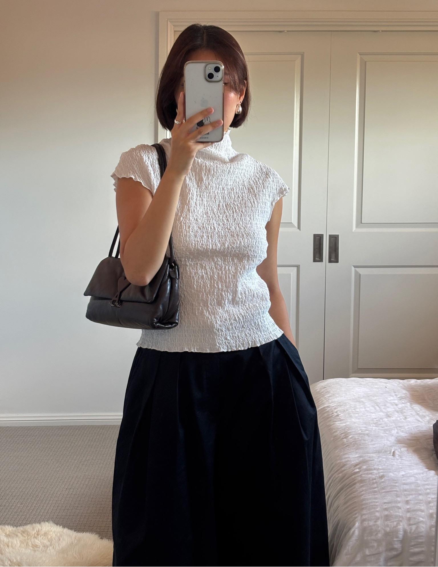 top from ellis label and shorts from kanware studios 