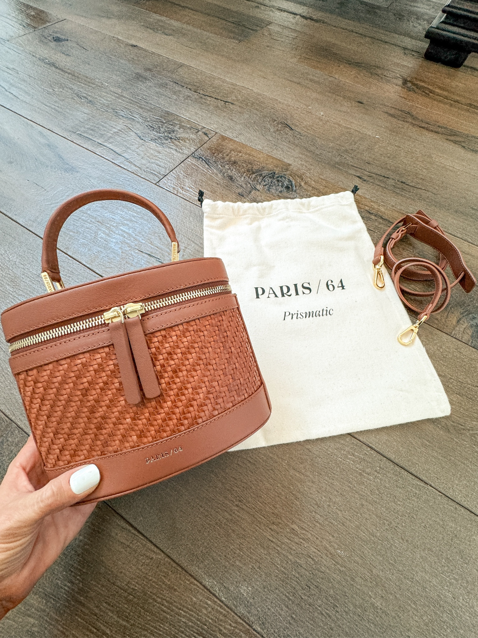 I am obsessed with my new Paris 64 bag!! Free shipping and free returns!
Prismatic Provence Brown, a braided cowhide leather bag. It can be worn as a handbag, crossbody or shoulder bag.
I can fit my iPhone 15+ promax phone plus my wallet and sunglasses plus a lip gloss and lip liner. It also is fully lined and it has an inner zipper pocket with a card holder as well. It is stunning! 

#LTKOver40 #LTKItBag