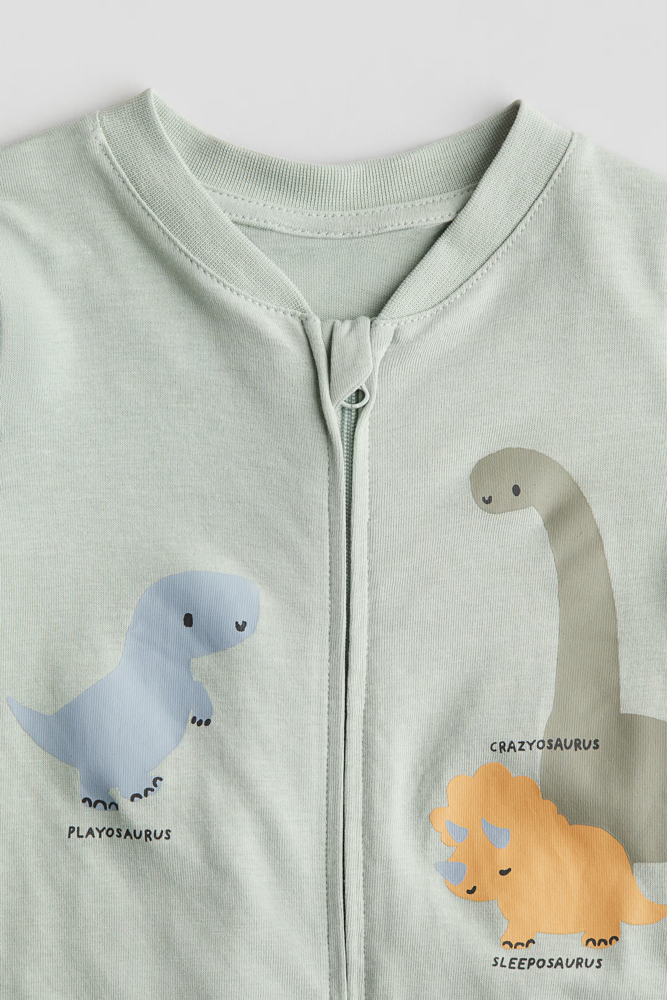 Patterned Pajama Jumpsuit - Light dusty green/dinosaurs - Kids | H&M US | H&M (US + CA)