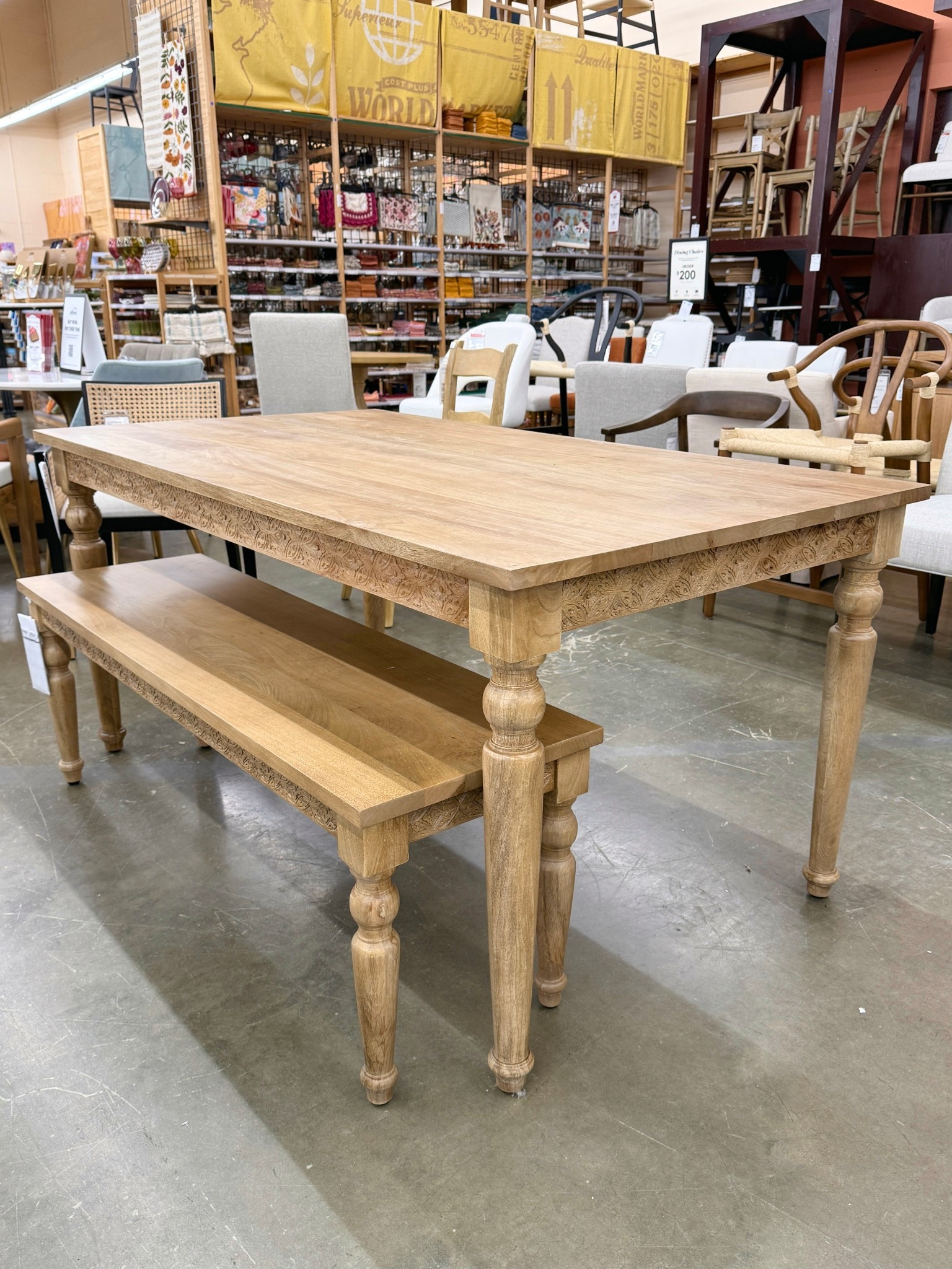 This hand-carved dining table + bench from World Market is crafted from solid mango wood and instantly gives that collected, lived-in look. ✨ The intricate carved detailing adds character, while the warm weathered finish keeps it timeless and versatile. Comfortably seats up to six and feels substantial, well-made, and built to last. I’ve linked a few similar dining styles to explore as well. 🤎 #WorldMarket #DiningRoomInspo #DiningTable

#LTKHome #LTKSaleAlert