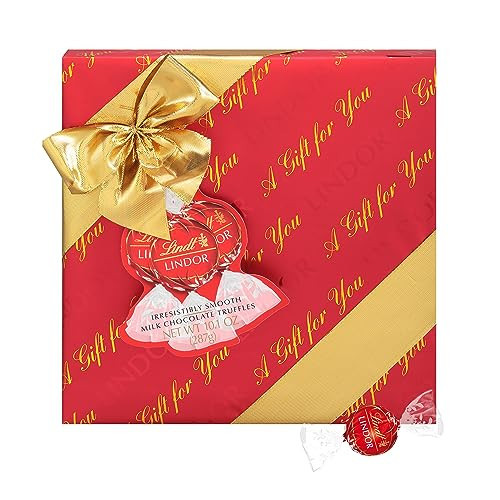 Lindt LINDOR Holiday Milk Chocolate Candy Truffles Wrapped Gift Box, Milk Chocolate with Smooth, Melting Truffle Center, 10.1 oz. | Amazon (US)