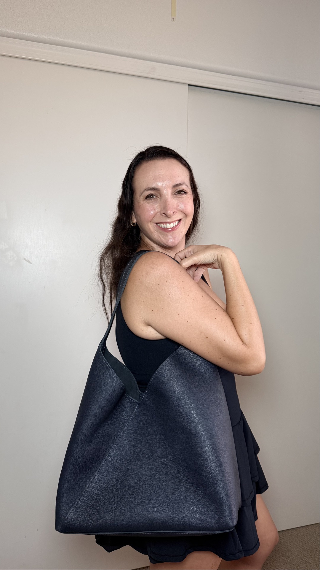 The kind of bag that makes every outfit look a little more polished. 💙✨

The Portland Leather Naomi in Night Owl is 100% leather, incredibly spacious, and the perfect combination of chic + practical. I got the oversized size because I love a bag that can hold ALL the things…and this one does it without looking bulky.

And yes… this is officially my FOURTH Portland Leather bag. I clearly have a favorite. 😂👜

#LTKgrwm #LTKootd #LTKMidsize