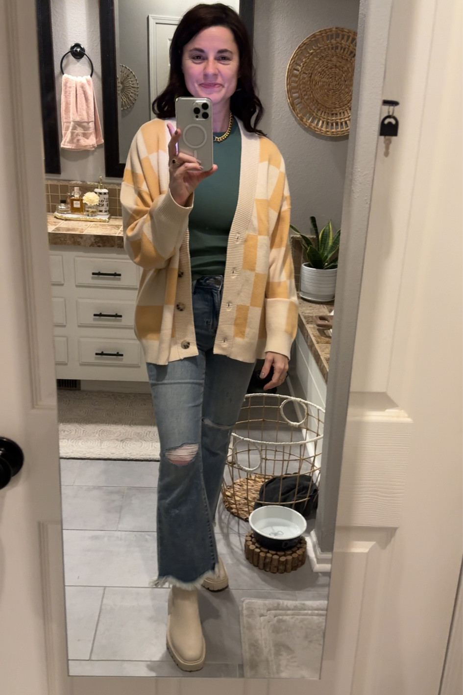 SWEATER CRUSH!!!  
I love an outfit that looks comfy and a bit different - this one hits the mark!  Sweater is oversized, baby tee runs TTS but I did size up, jeans are TTS with very little stretch, and boots are TTS!

Use code “October20” at Pink Lily for a discount!

#LTKxMadewell #LTKstyletip #LTKfindsunder100
