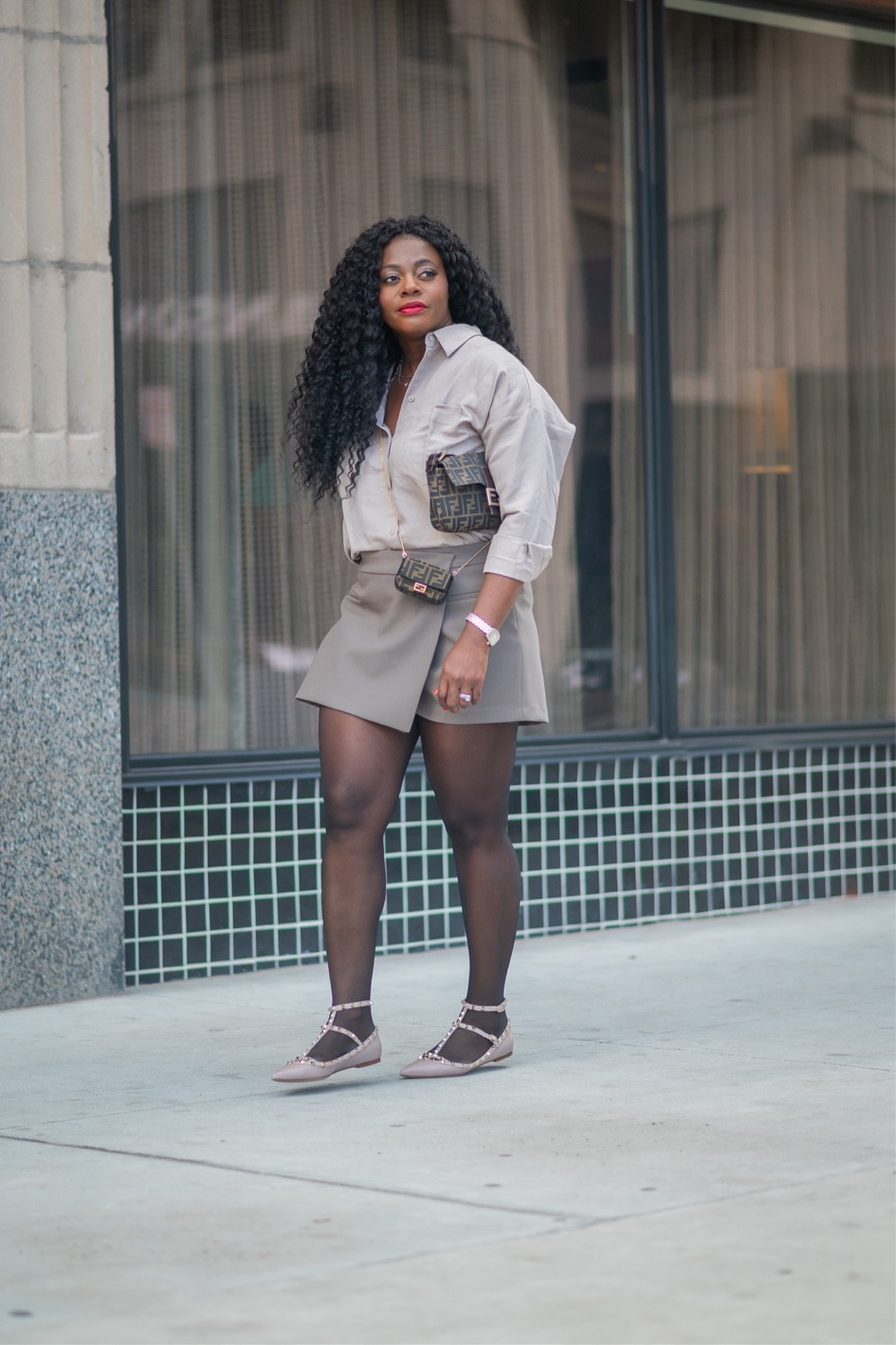 Slightly cooler temps here calling for some layering! 

Outfit 
Skirt: Zara
Shoes: Valentino
Both bags: fendi
Short: H&M 