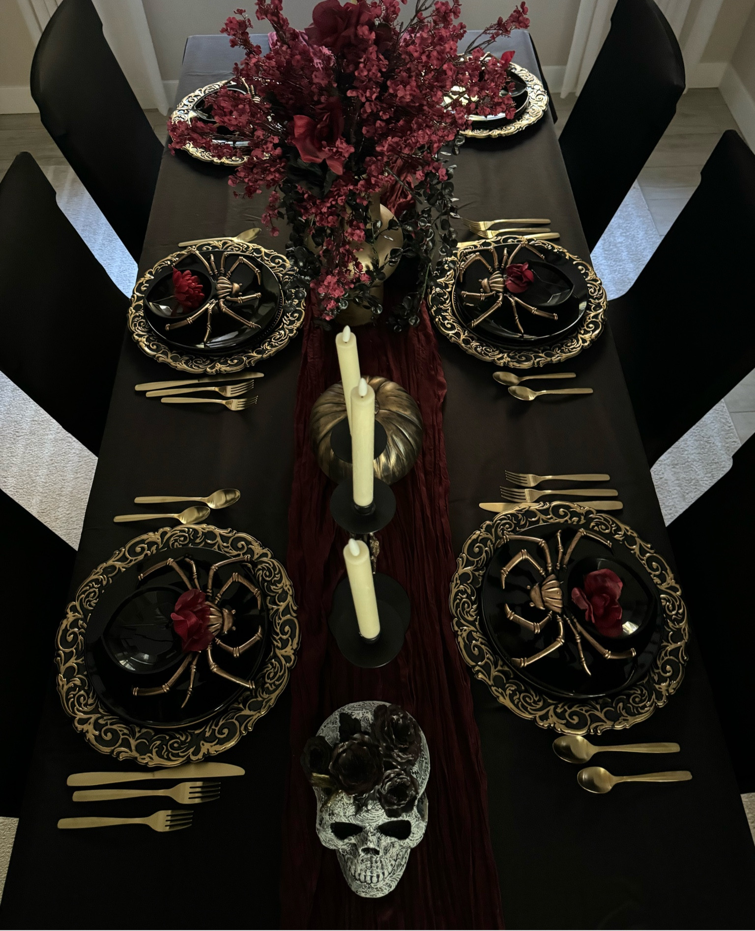 Halloween Tablescape 


#tablescape #halloween #chargers #batteryoperatedcandles skulls #spiders #amazon 