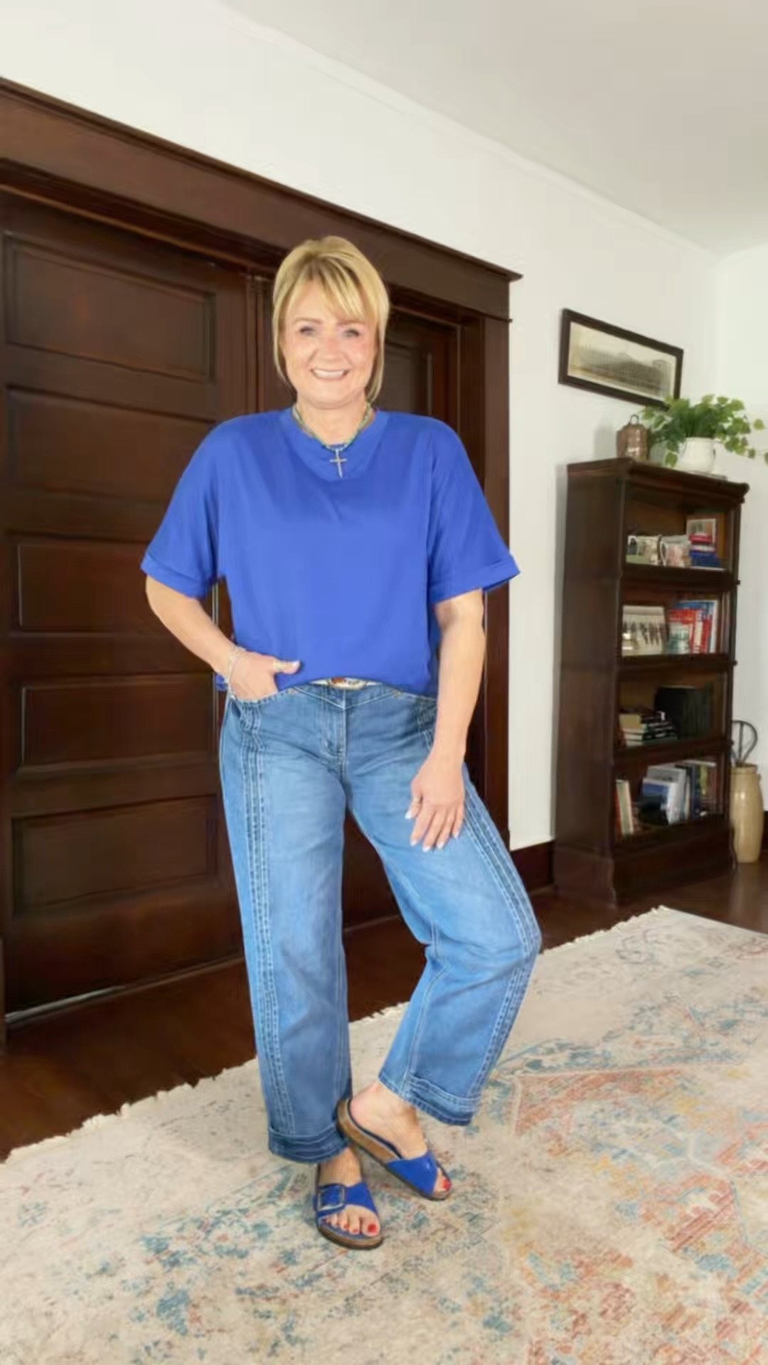 This top is roomy.  I sized down to wear everyday.  To workout out in I would have ordered my true size. 
Jeans  are true to size.

#LTKootd