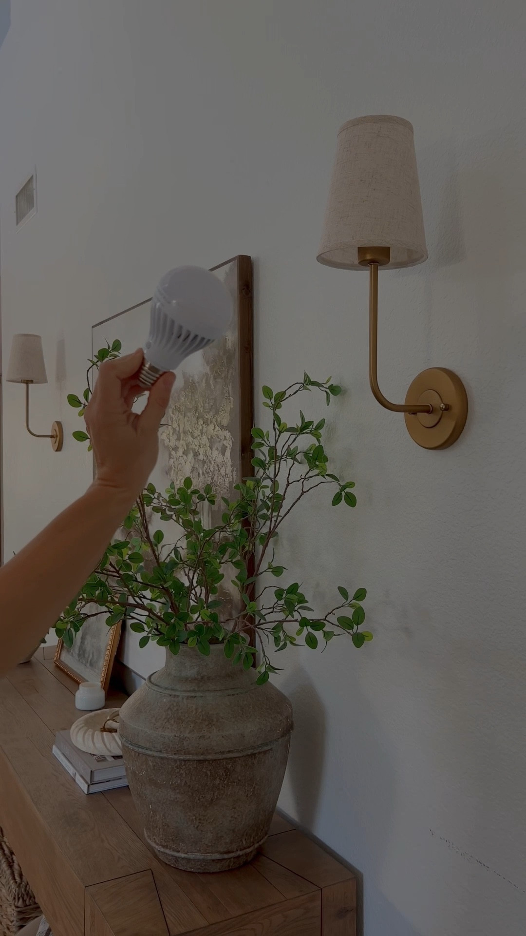 Wall sconces with battery powered light bulbs 💡 
Entryway Decor 
Console Table 

#LTKHome #LTKFamily #LTKFindsUnder100