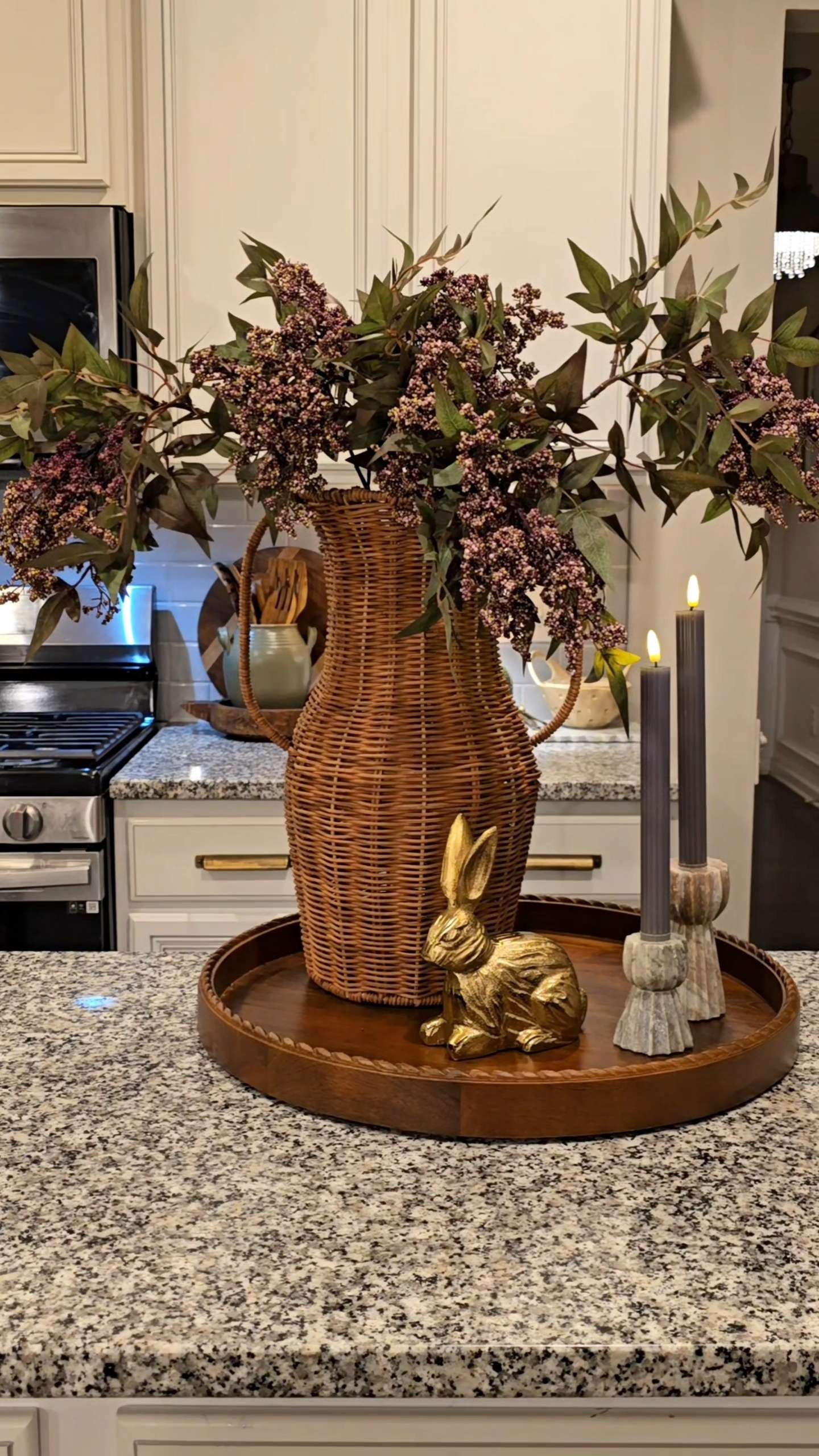 Spring Kitchen Island Styling with berry stems and this gorgeous rattan vase! It comes with a glass insert so feel free to use real flowers and add water.  

 #LTKSeasonal #LTKHome #LTKSaleAlert