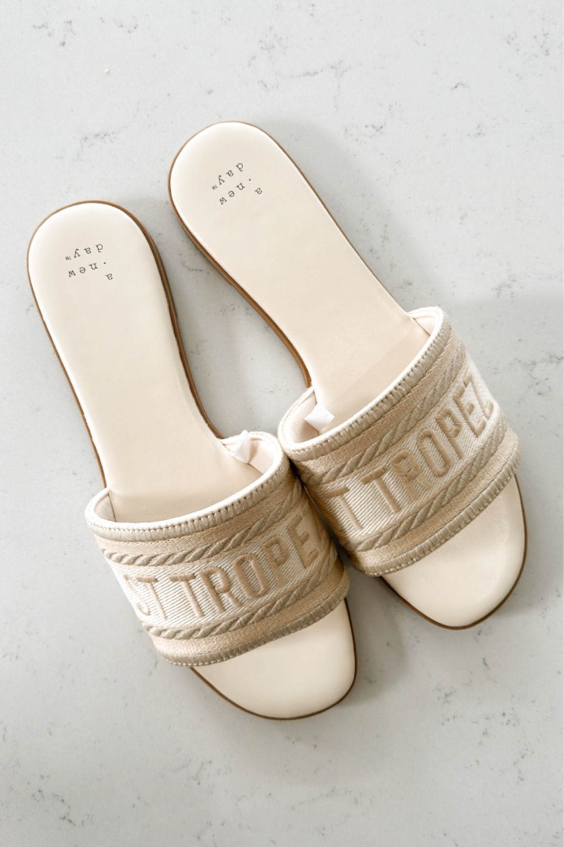 New arrival. Summer slide. Spring slide. Sandals. Dupe. Look alike. Steve Madden. Target style. Neutral style. Neutral shoes. Summer style. Spring style. Beach outfit. Summer outfit  

#LTKstyletip #LTKfindsunder50 #LTKshoecrush