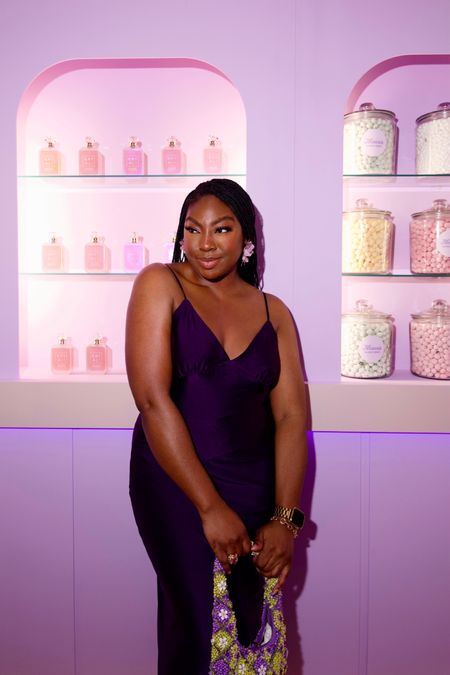 Curating Sweet Moments👇🏾🍬💕✨
Here are some highlights from the launch event of Kayali’s newest fragrance ‘Vanilla Candy - Rock Sugar 42’.

There is so much power in Frangrances! I am a huge selfcare girl who believes you should practice it in all elements of your life. I love how you can curate perfume to make you feel more confident, sexy or relaxed to suit your mood.

I’m really hoping to share more fragrance content with you and practice some perfume flatlay too!
Thank you again @tracepublicity @kayali @monakattan for having me!!

Check out my last reel for a small video clip of me meeting Mona (sorry no pictures - my phone was in video mode the entire time 😭) + you’ll also to hear my thoughts on the fragrance! 💕🍬✨

…spoiler alert.
I love sweet, warm, vanilla based perfumes and this is like holiday in a bottle 😍😍💕

- purple dress & embellishedbag @zara
- earrings @hm 
- heels @katmaconie 

*this post contains PR gifted perfume

#kayaliperfume #kayali #beautybloggersuk #midsizefashion #fragrancelovers #perfumeblogger #luxuryperfume #curvyconfidence #selfcaredaily

#LTKbeauty #LTKuk #LTKmidsize