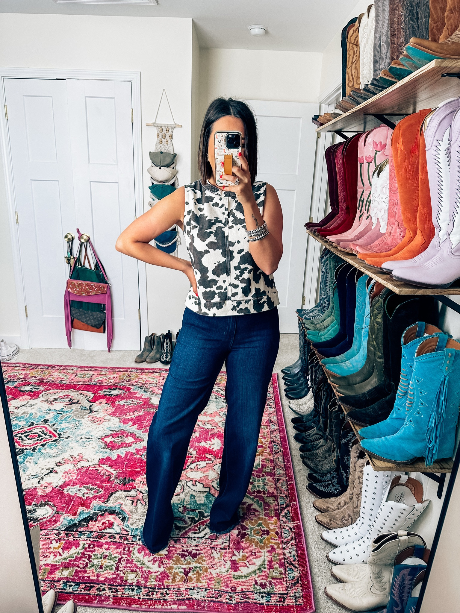 Western cow print denim tank from Amazon and a medium Kimes ranch jeans and a size 6x34 and sea western Rodeo concert Country concert ￼