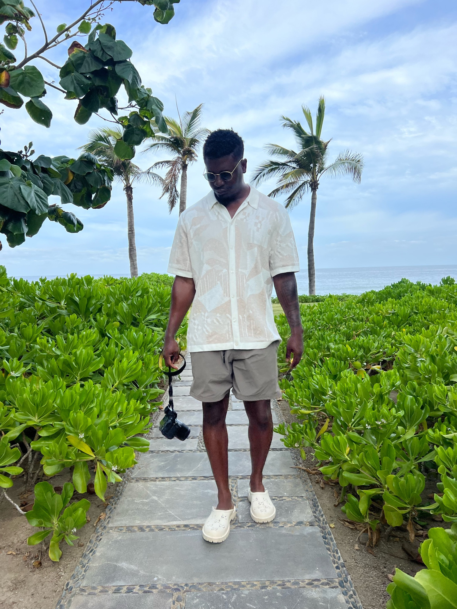 Abercrombie pattern cotton shirt, Gucci slides, brown Terry shorts, nikon camera 

#LTKtravel #LTKshoecrush #LTKmens