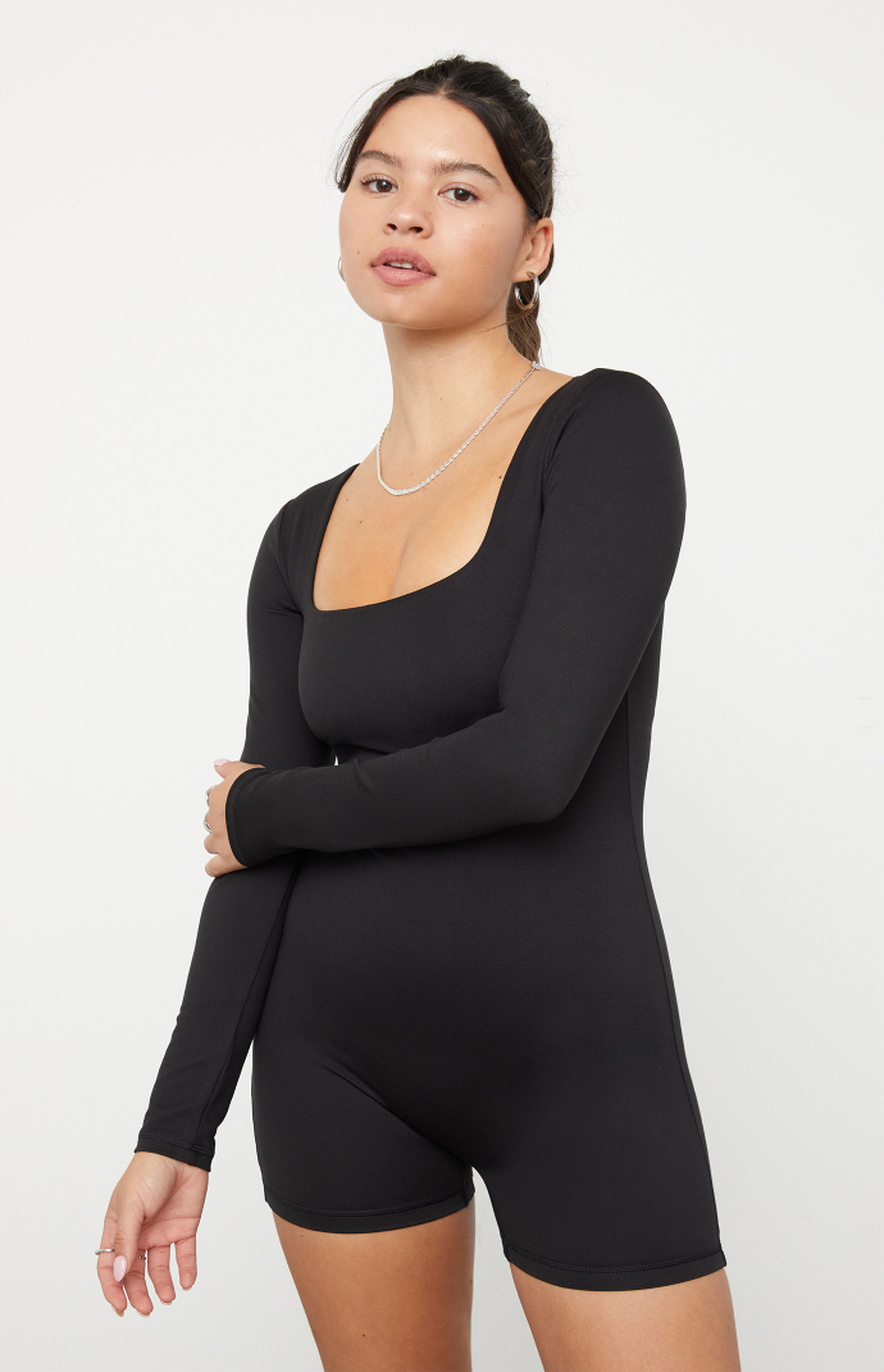 PAC 1980 PAC WHISPER Active Black Cindee Long Sleeve Short Onesie | PacSun