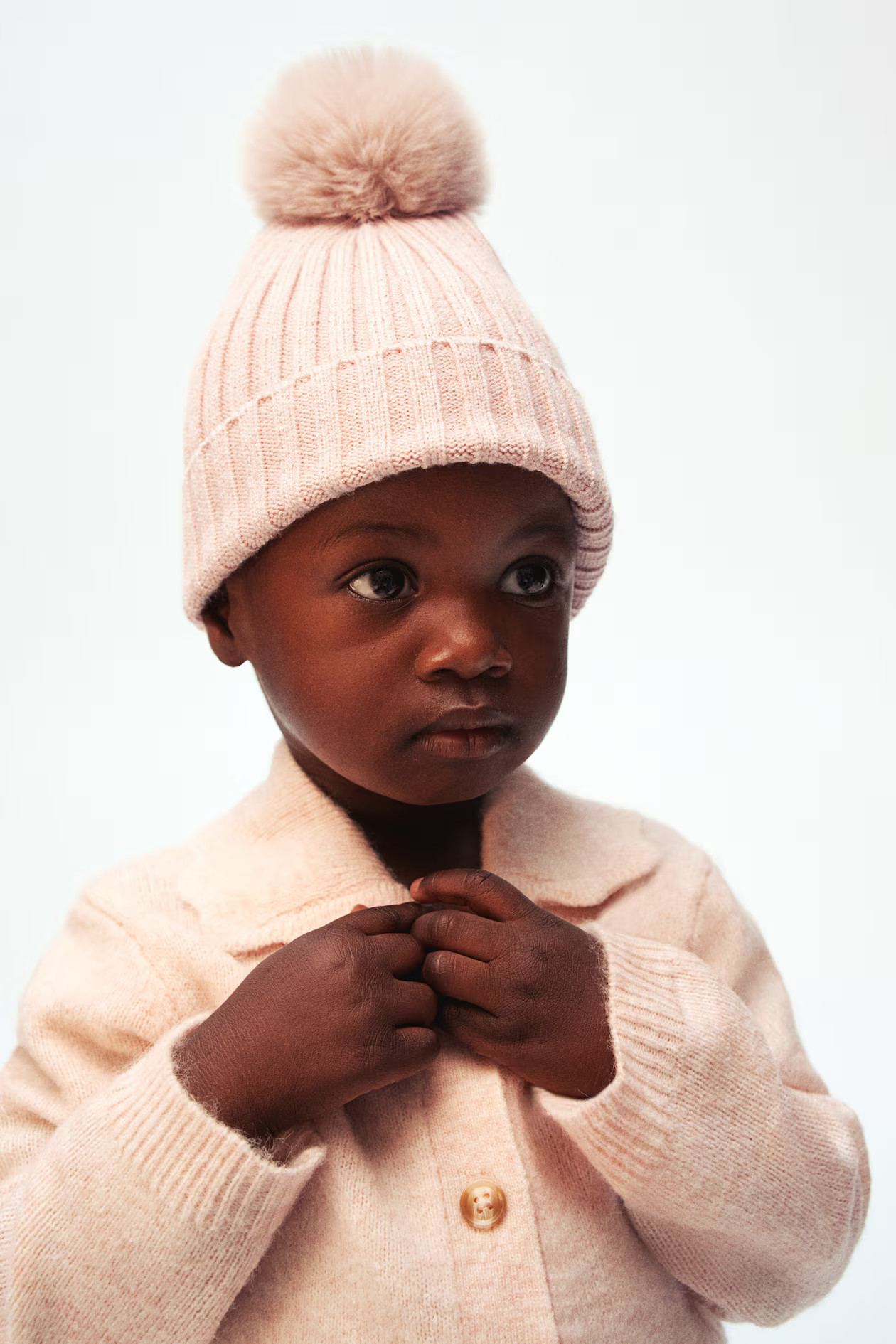 Rib-knit pompom hat | H&M (UK, MY, IN, SG, PH, TW, HK)