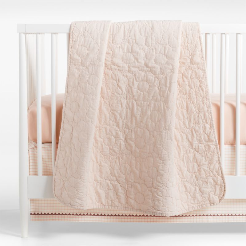 Sunwashed Shell Pink Daisy Organic Cotton Baby Crib Quilt | Crate & Kids | Crate & Barrel