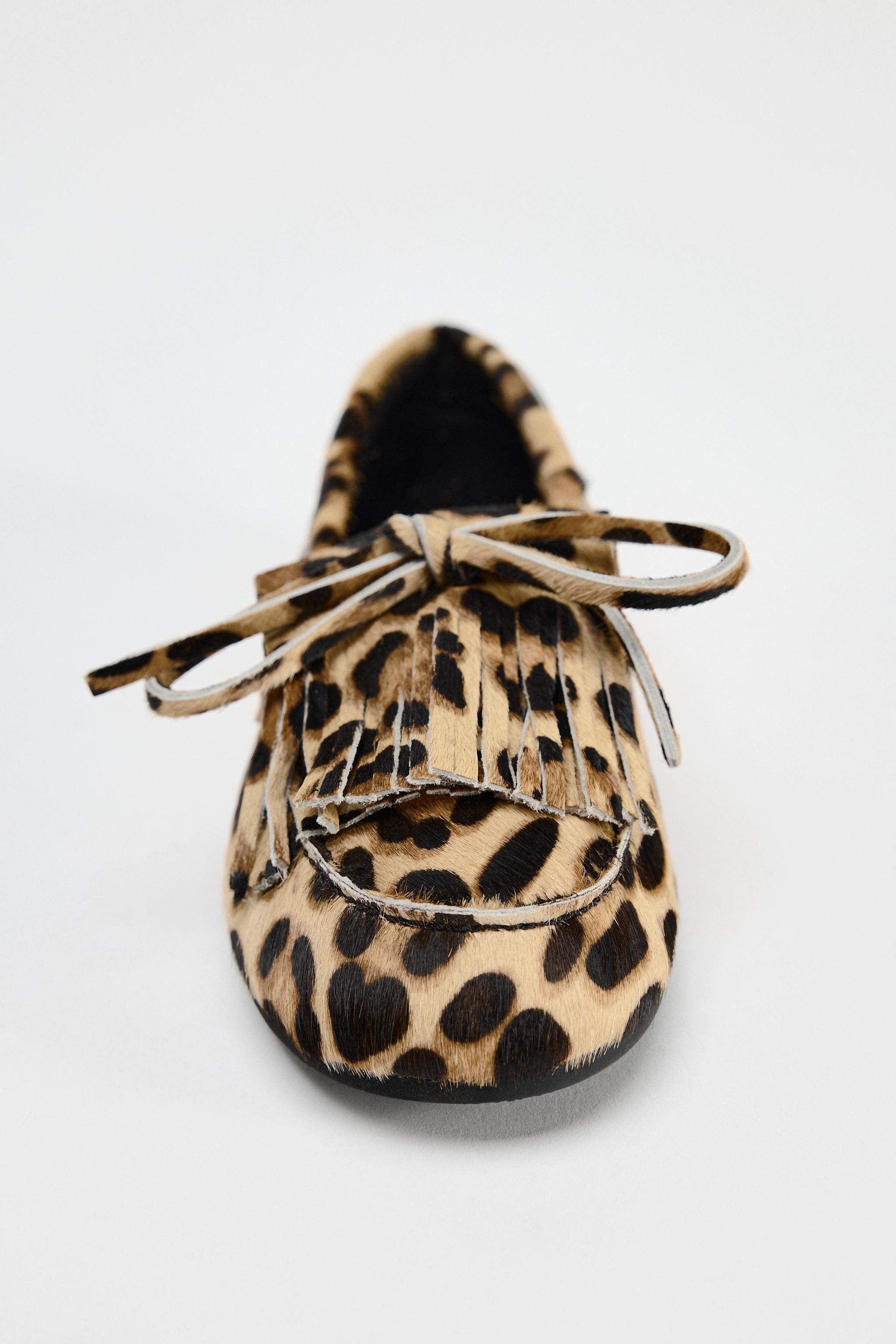 Leather and sheepskin loafers. Animal print. Fringing and bow detail on the front. Contrast stitc... | Zara UK