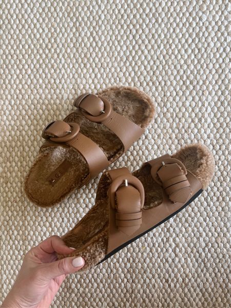 I have loved this shearling lined sandals - should splurge on the non shearling style. SO comfortable  