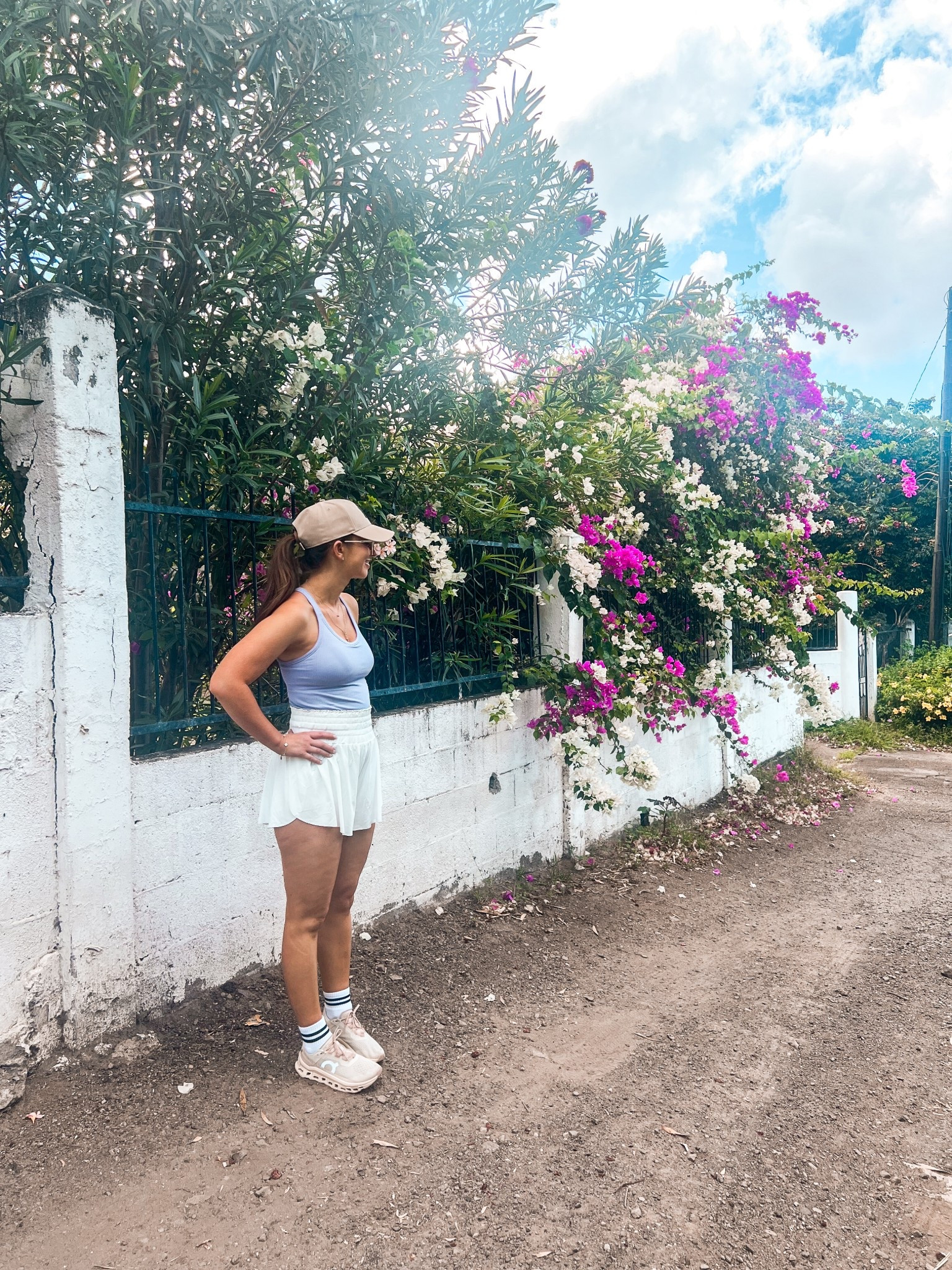 Womens white high waisted running shorts-medium
Tank top with built in bra-medium
On cloud monster beige and pink running sneakers
Womens white socks with black stripes
Beige and black yankee hat