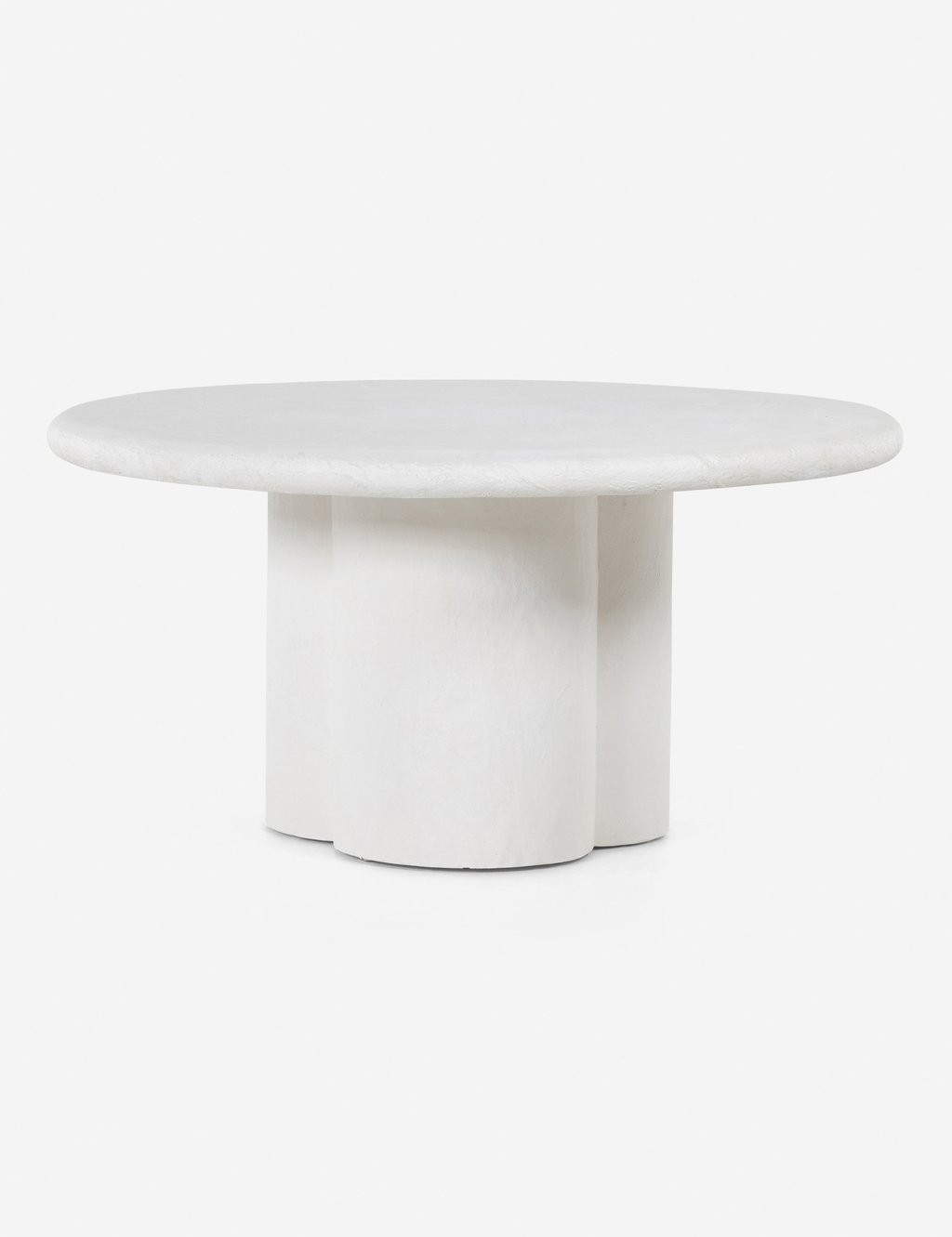 The stark white finish and gentle, earthy lines of this round dining table offer up warm minimali... | Lulu and Georgia 