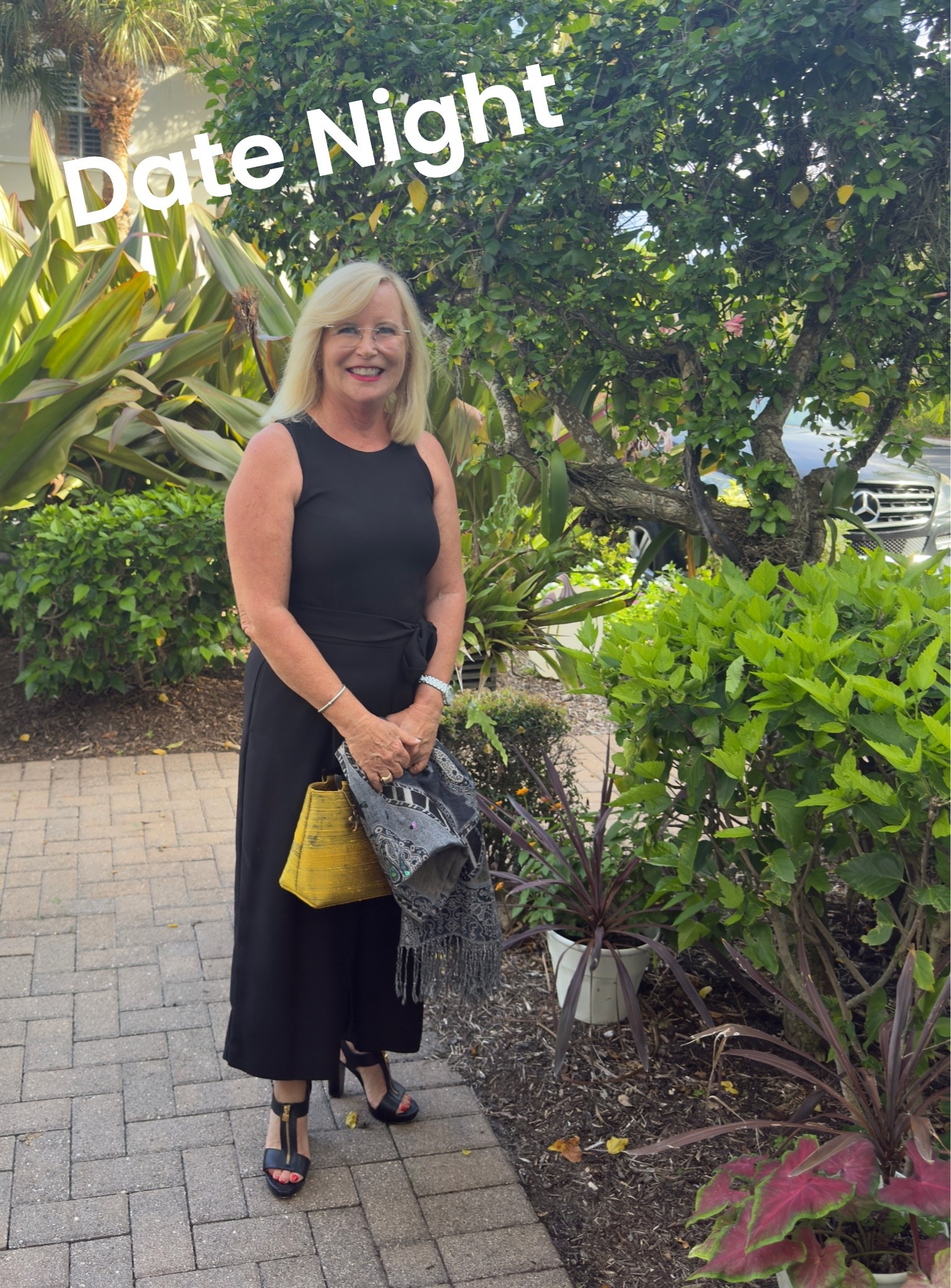 Staples that never fail: the perfect black jumpsuit, a gold statement bag, and comfortable chunky heels. Who else loves a monochromatic look?

Shop this look here: 

#LTKDateNight #DateNightOutfit #OOTD #BlackJumpsuitStyle

#LTKOver40 #LTKootd