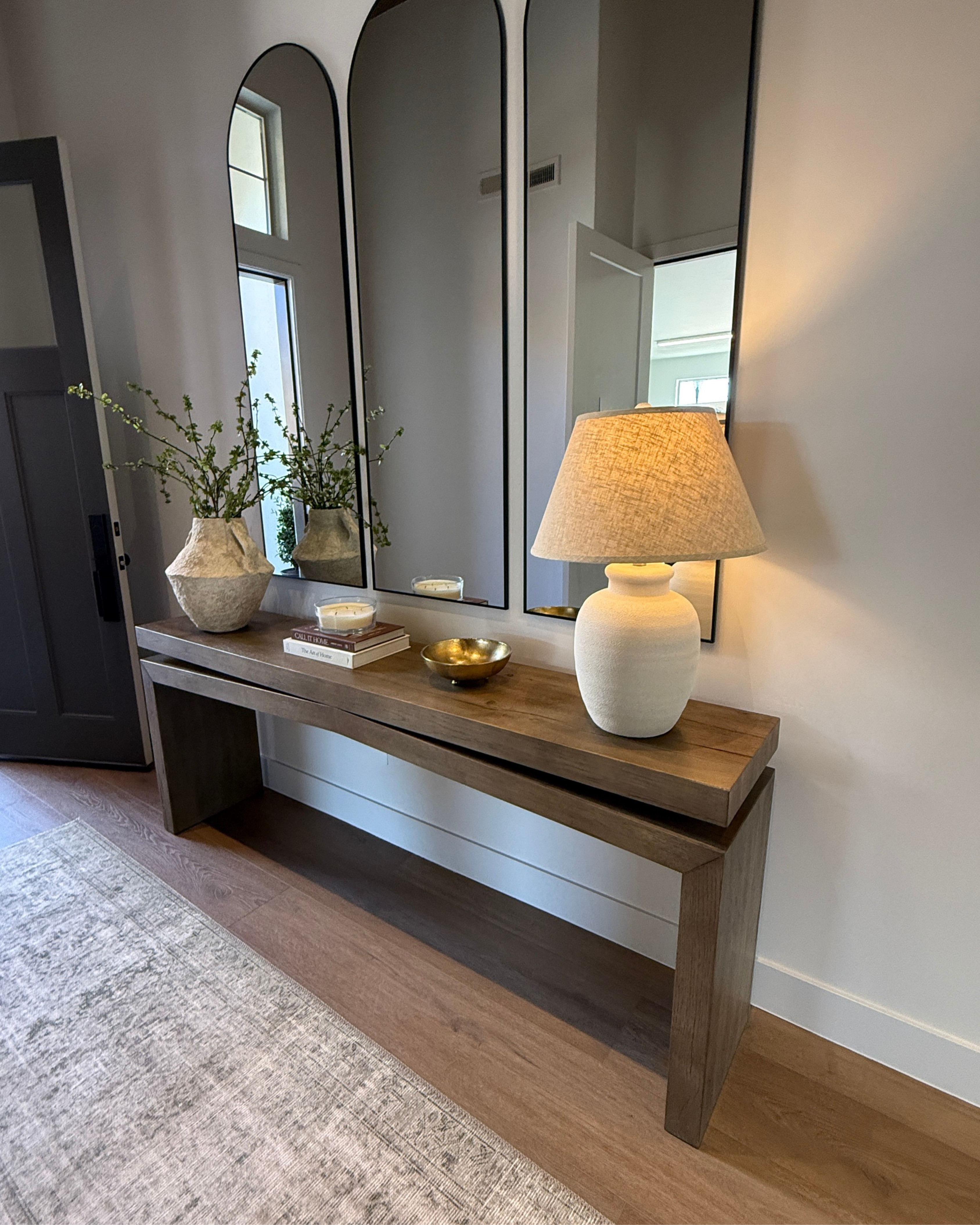 A neutral rustic entryway with an elegant touch 🤎 Soft textures, warm wood tones, and timeless pieces come together to create a space that feels both inviting and elevated. The perfect first impression for your home. #entrywayfinds #homefinds 

 #LTKHome #LTKSaleAlert