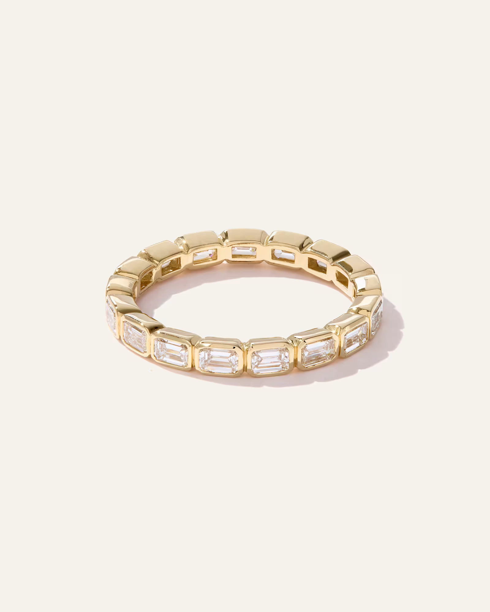 Lab Grown Diamond Emerald East-West Bezel Eternity Band in Yellow Gold | Quince