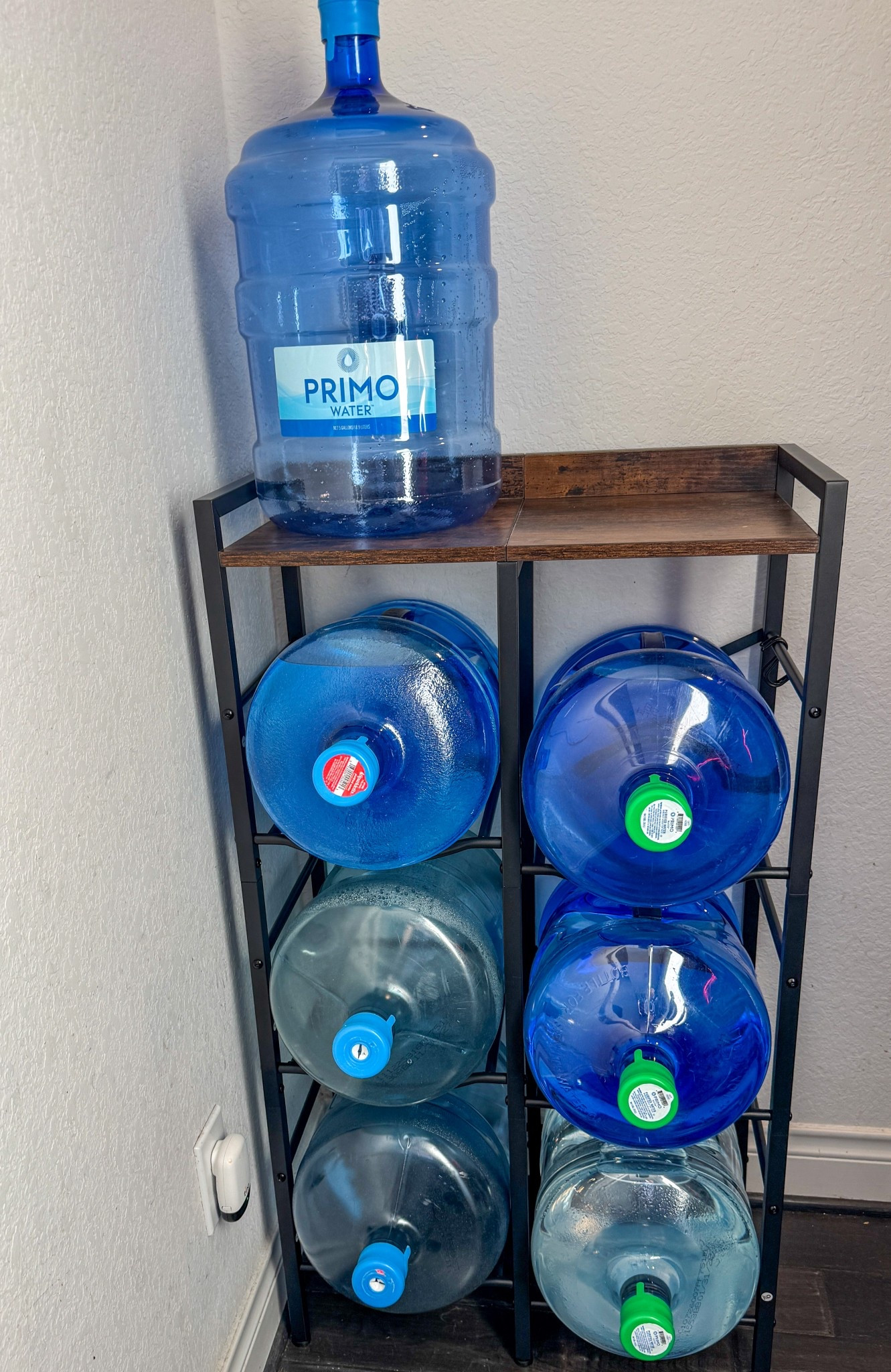 I purchased this HOOBRO 5 Gallon Water Jug Holder Rack. It’s a 3 Tier Water Bottle Holder helps keep the water bottles organized and neat. #waterjugholder #organization #homeorganization

#LTKHome
