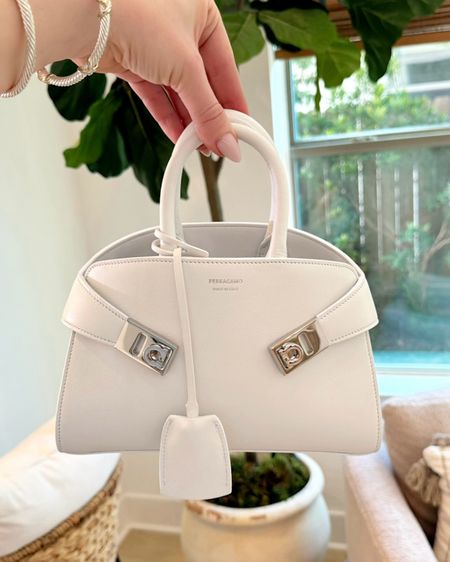 Ferragamo Handbag 🤍 I recently unboxed this new Ferragamo Mini Hug Leather Top Handle Bag 😍 more white handbags at every price point linked below! 

Handbag, Ferragamo, Ferragamo Handbag, Summer Handbag, White Handbag, Madison Payne 

#LTKItBag #LTKSeasonal #LTKStyleTip