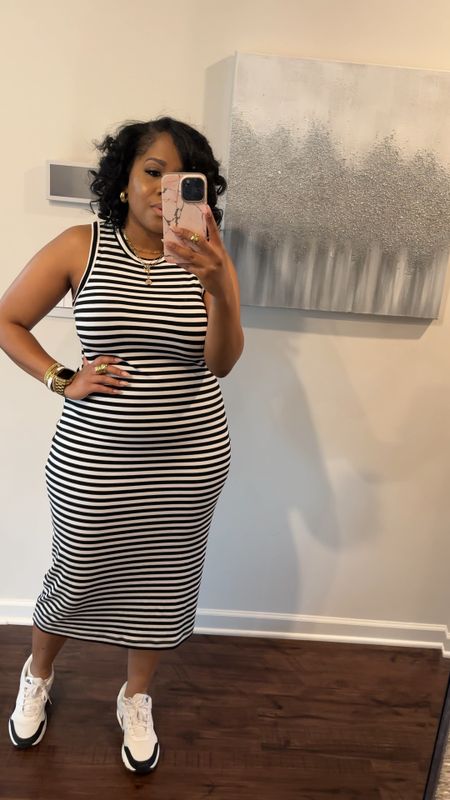 Cute Easy Stretchy Dress
For Spring. The stripes give a little illusion and hide my “problem” area a bit while I get my body back in order. Size 14-16 wearing a large. 

#LTKmidsize #LTKstyletip #LTKover40