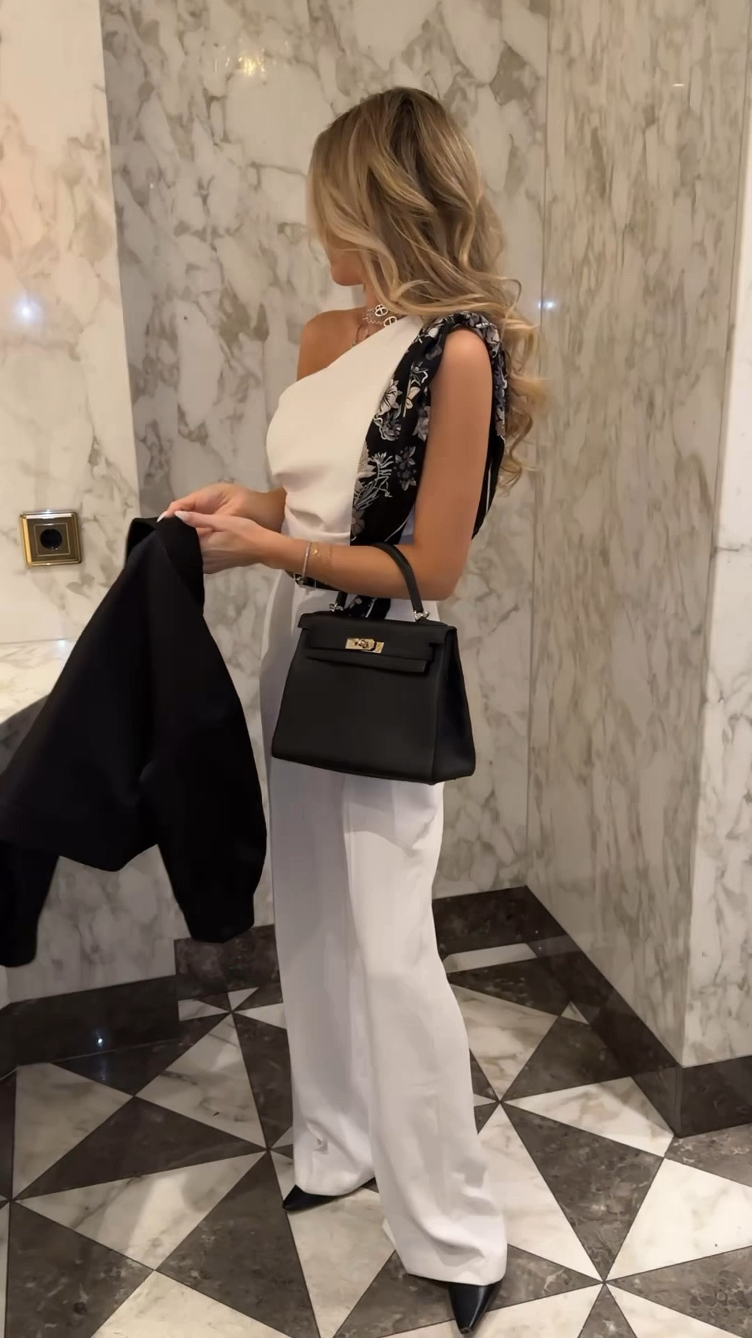 An effortless chic evening look wearing this elegant white one shoulder jumpsuit. Paired it with black details; adjustable waist belt, black scarf, black Hermes Kelly bag and a silky chic bomber jacket 🖤

#LTKWatchNow #LTKParties #LTKStyleTip