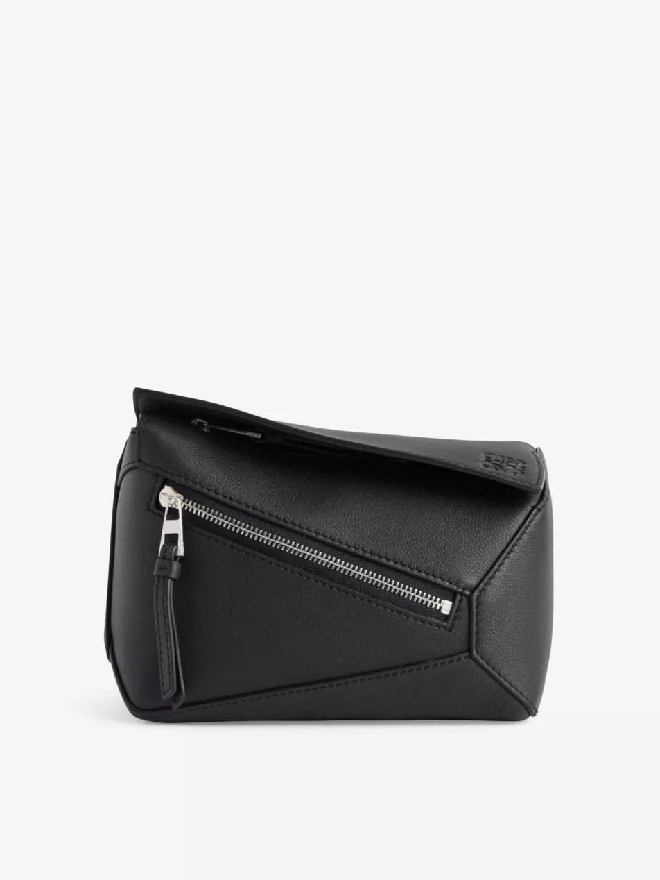 Puzzle Edge brand-debossed mini leather bum bag | Selfridges