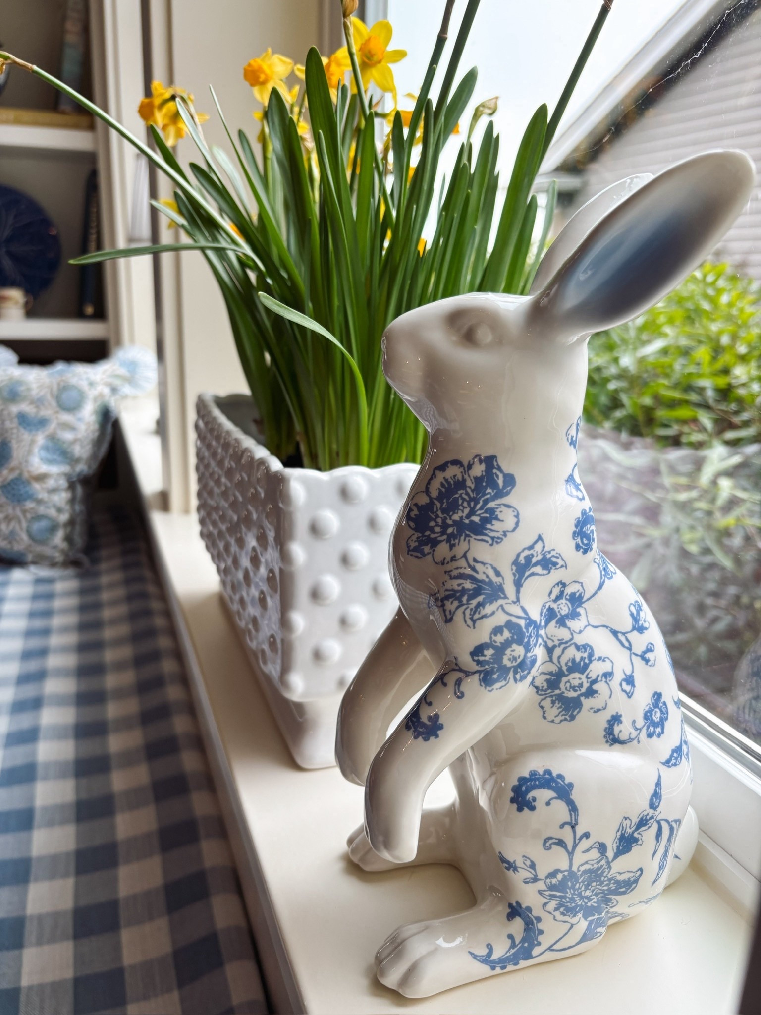 Spring decor from 2026 from Wayfair - blue and white floral bunny, white hobnail planter 

#LTKHome #LTKSeasonal #LTKSaleAlert