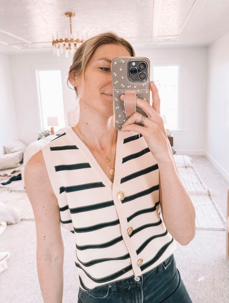 Some of my favorite Abercrombie jeans (length is long) and the cutest striped vest from amazon! It has the cutest button details too 🥰

#LTKSeasonal #LTKstyletip #LTKfindsunder50