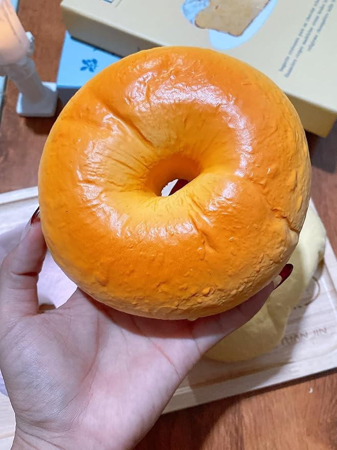 Large Slow Rising Squishy，Sticky Butter Sticks Squeeze Toy,Party Favor (Giant Bagel Squishy) | Amazon (US)