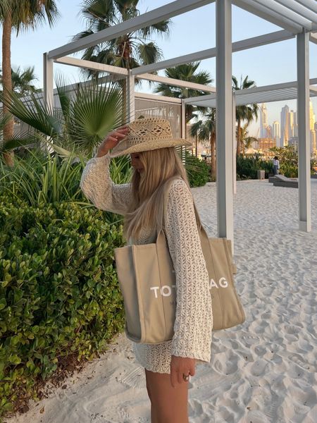 Crochet beach dress cover up, western cowboy cowgirl hat, Marc Jacobs the tote bag large 

#LTKSeasonal #LTKbump #LTKitbag