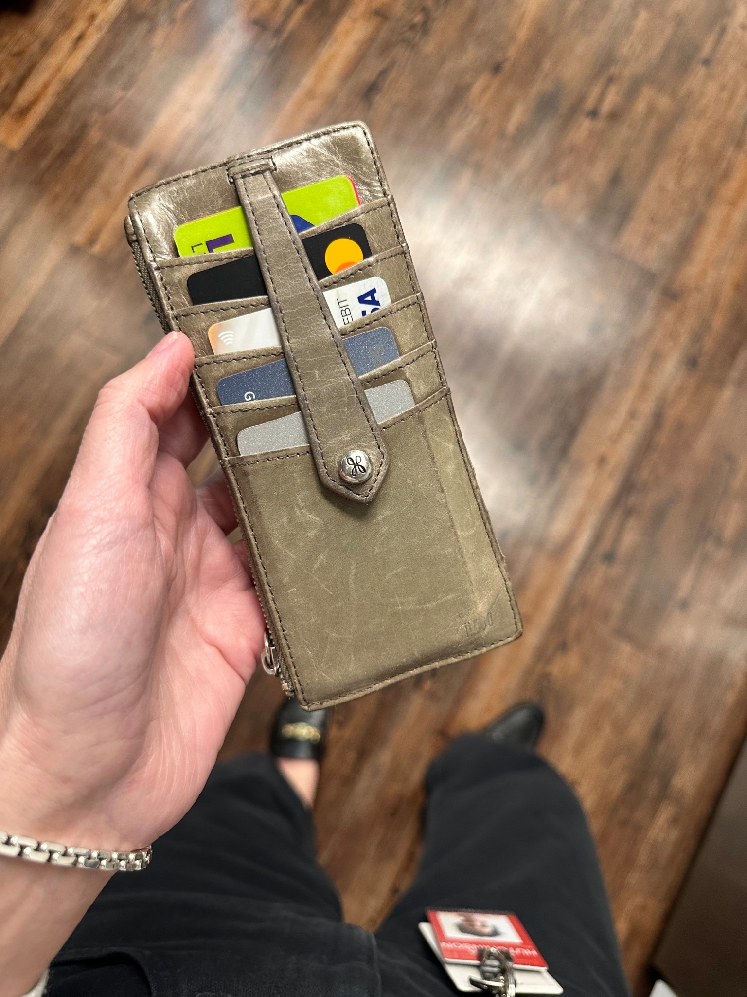 Hobo Card Wallet - Ive had this one for a long time. It’s my favorite style wallet if you carry mostly cards. Great quality too! My color is like a taupe and older but I linked current ones! 